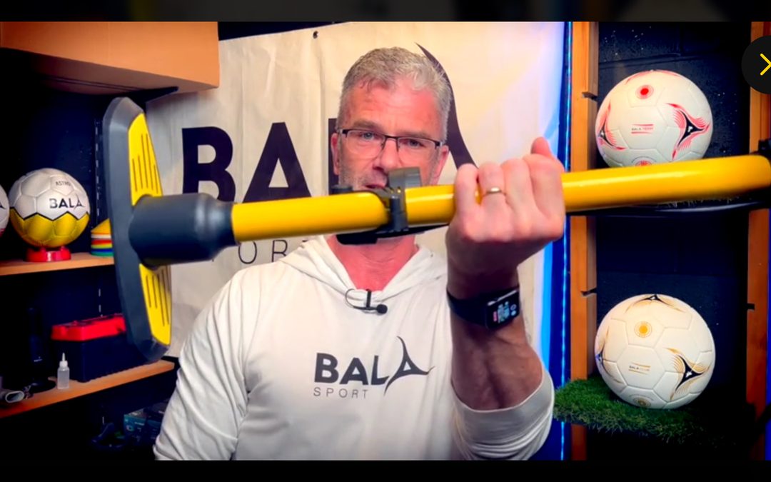 Alan demonstrating how to inflate a fair trade football
